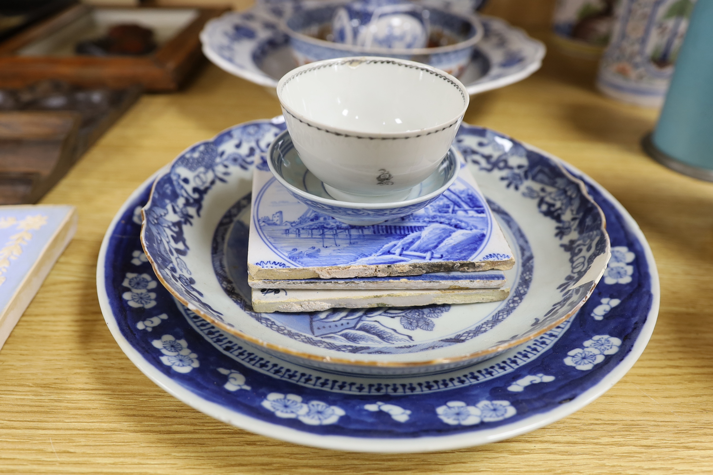 A Meissen style onion-pattern dish, Chinese ceramics and three Delft tiles